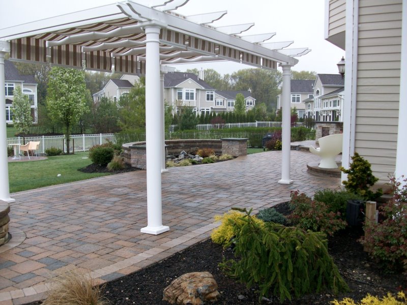 trex pergola with slide shades